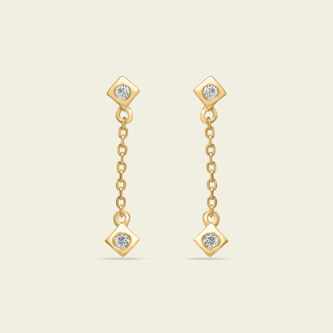 Boucles d'oreilles en or et diamants, motif graine de vie.