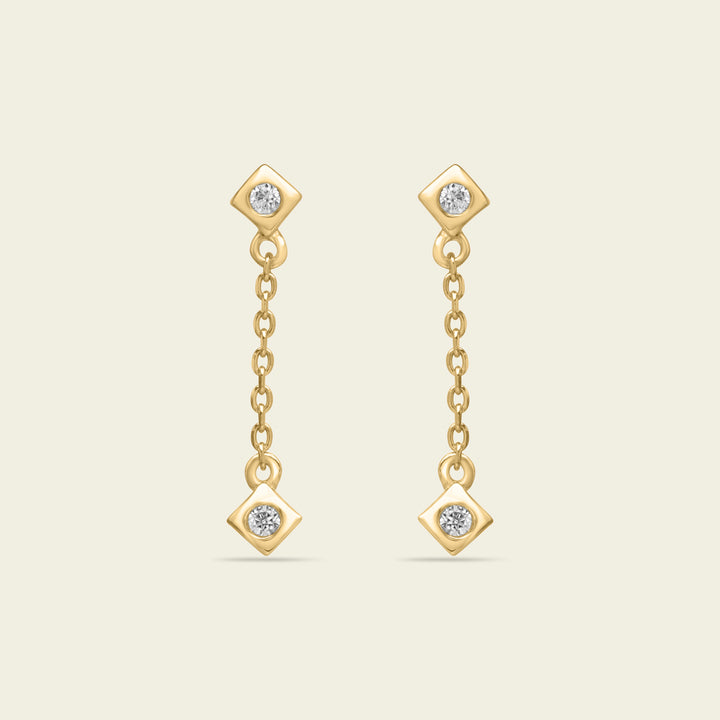 Boucles d'oreilles en or et diamants, motif graine de vie.