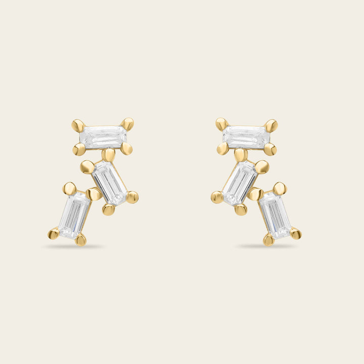 Clous d'oreilles triple baguette or et diamants dularee